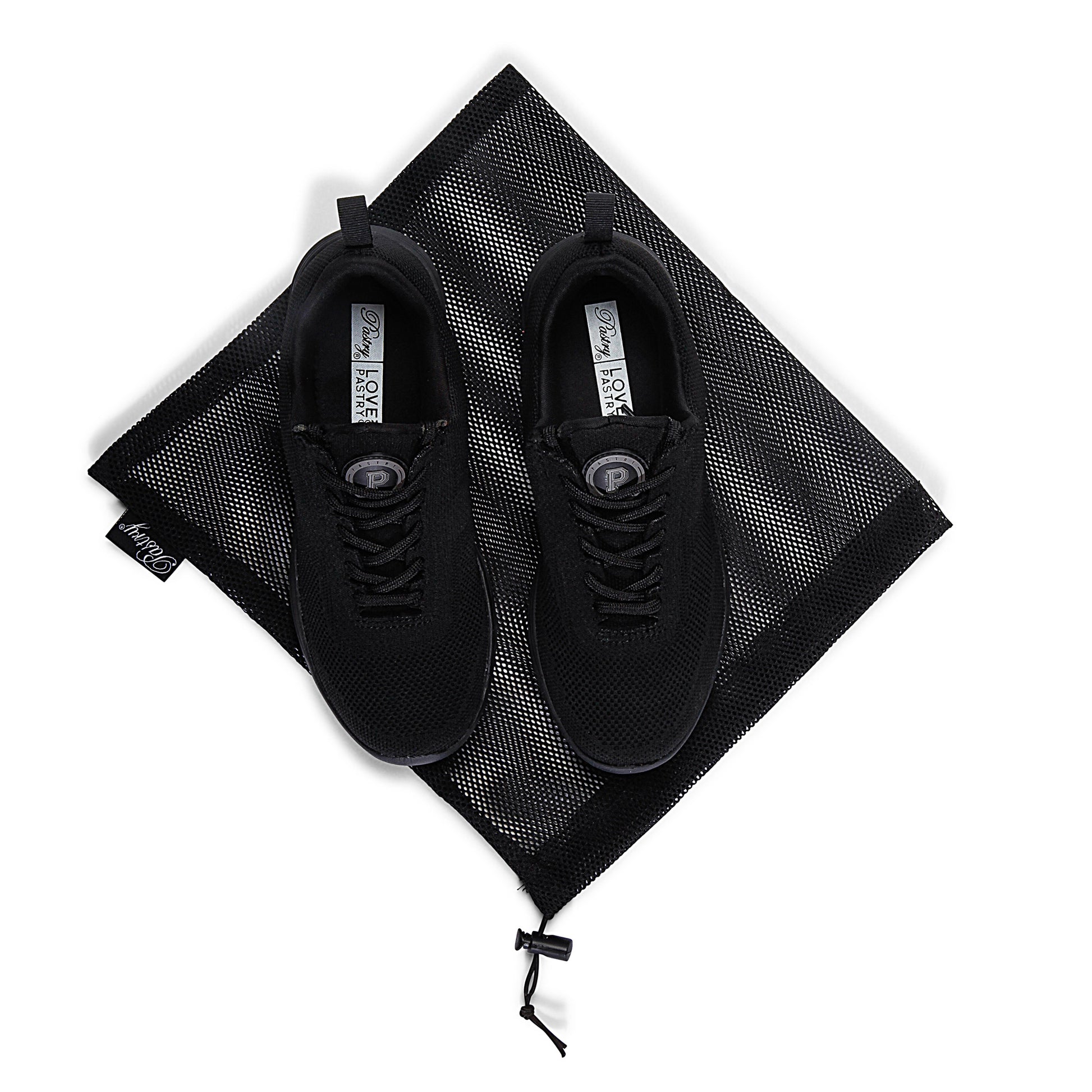 Pair of Pastry Studio TR2 Adult Women's Sneaker in Black/Black with bag