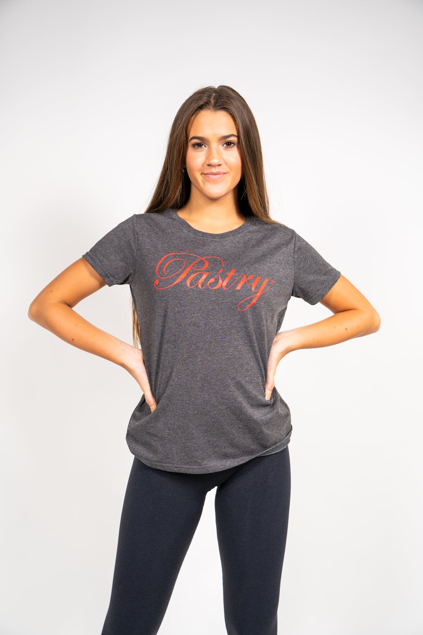 Woman wearing Pastry Tee Shirt Charcoal with Red Logo