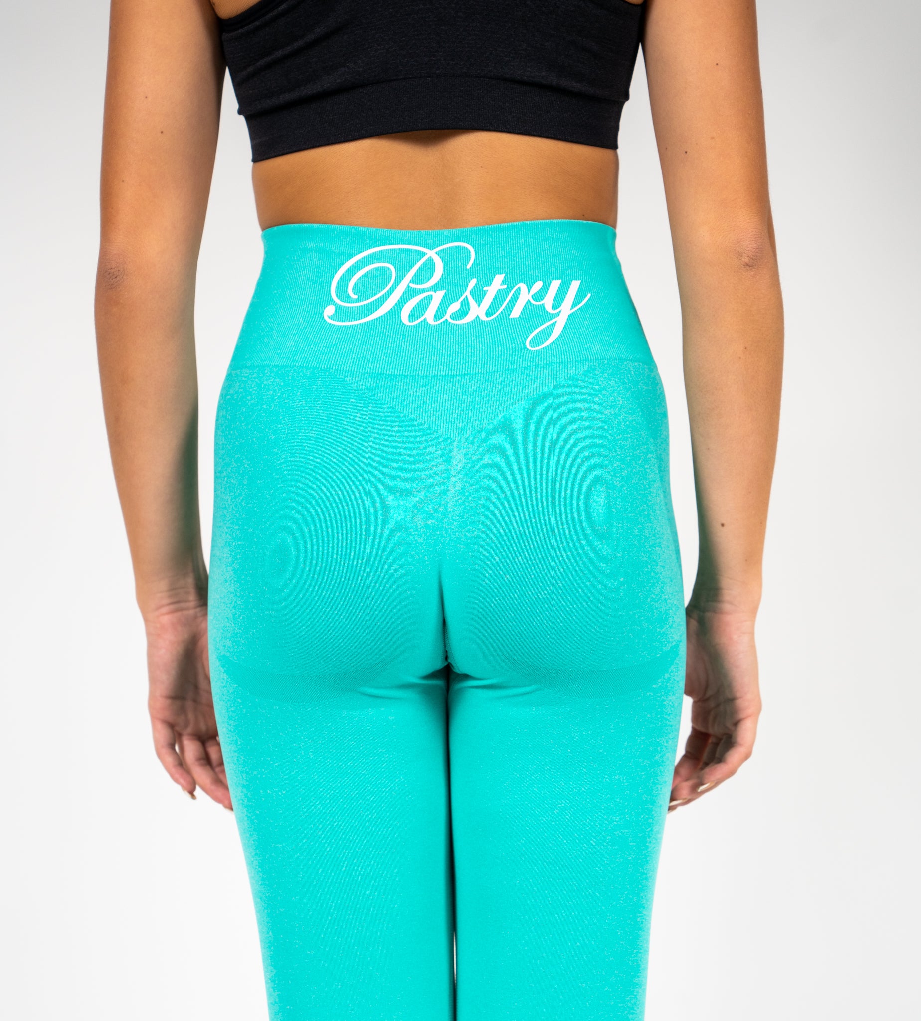 Woman wearing Pastry Seamless Leggings Mint Marl back view