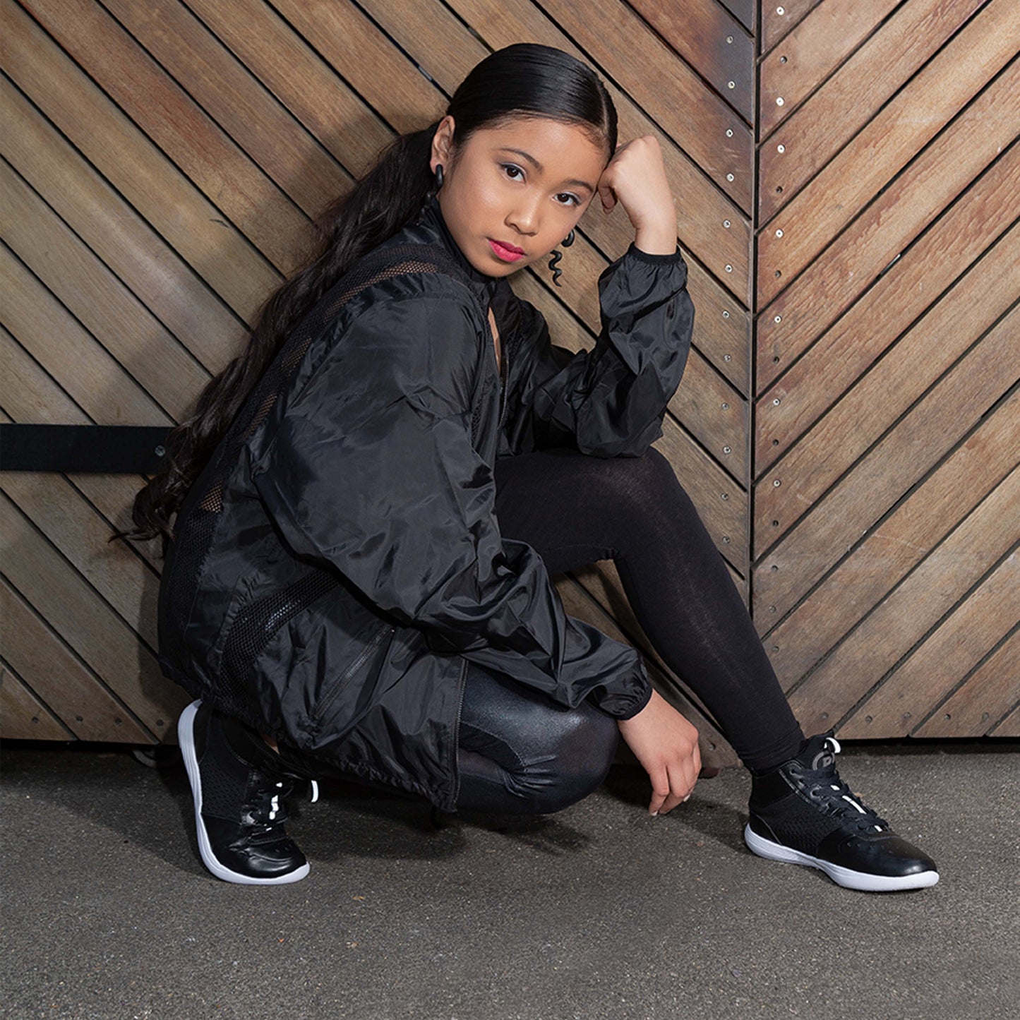 Woman wearing Pastry Ultimate Hip Hop Youth Sneaker in Black/White