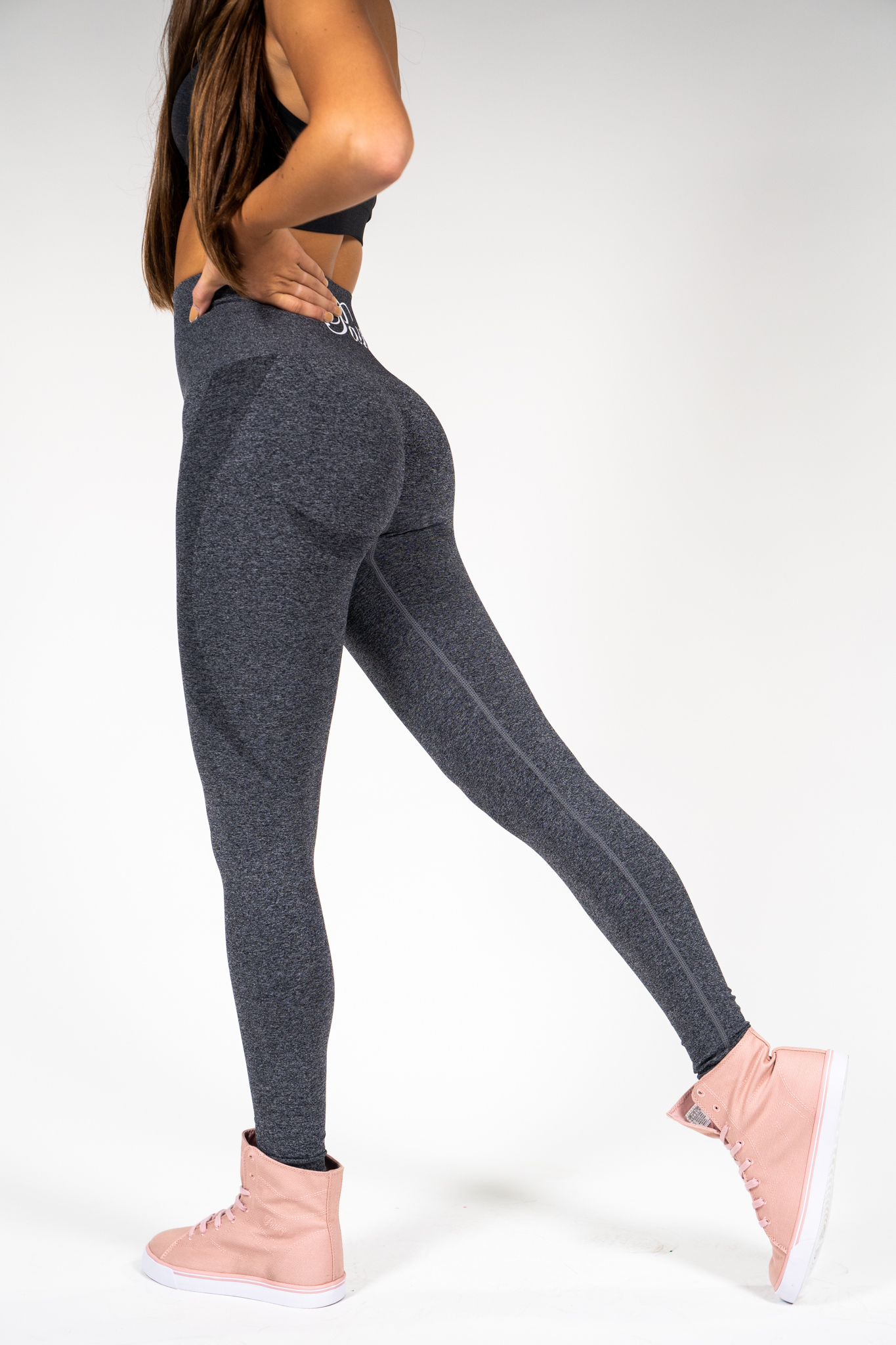 Woman wearing Pastry Seamless Leggings Black Speckled Marl side view